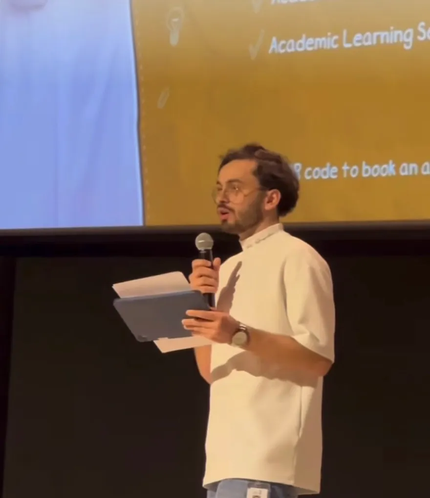 Speaking on stage for students
